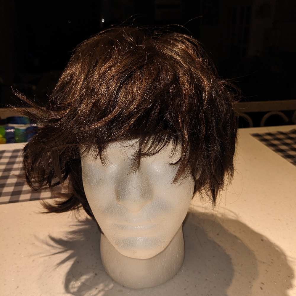 Used ruffled brown wig